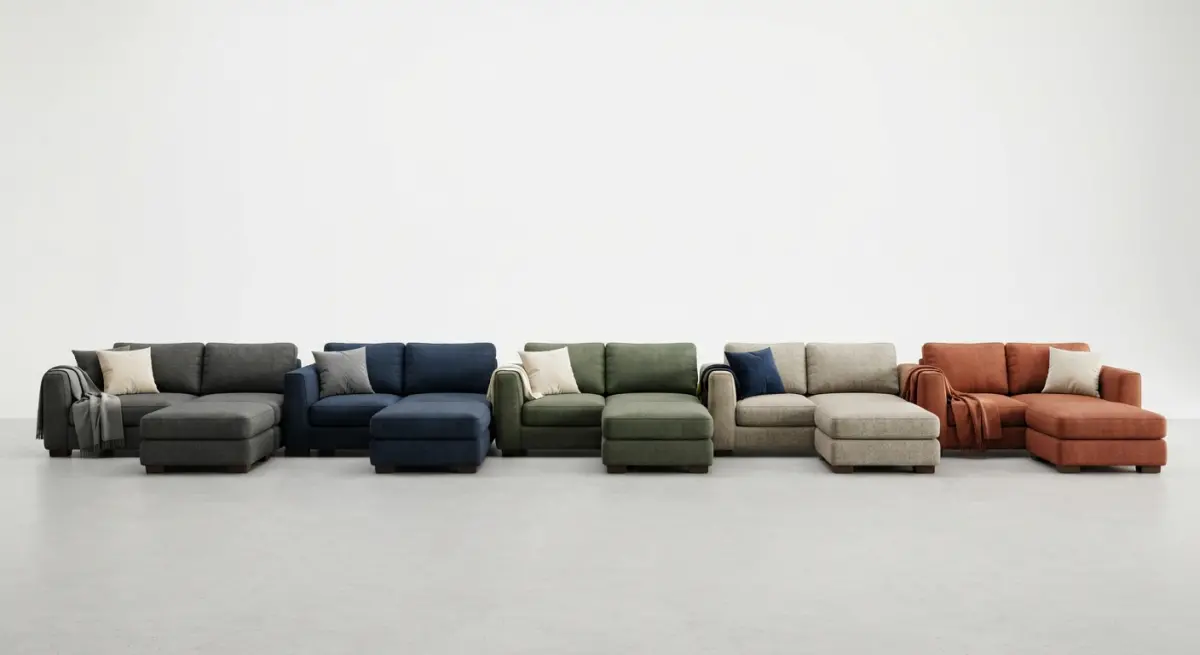 3D render of a collection of modular sectional sofas in various colors and fabrics, studio setting
